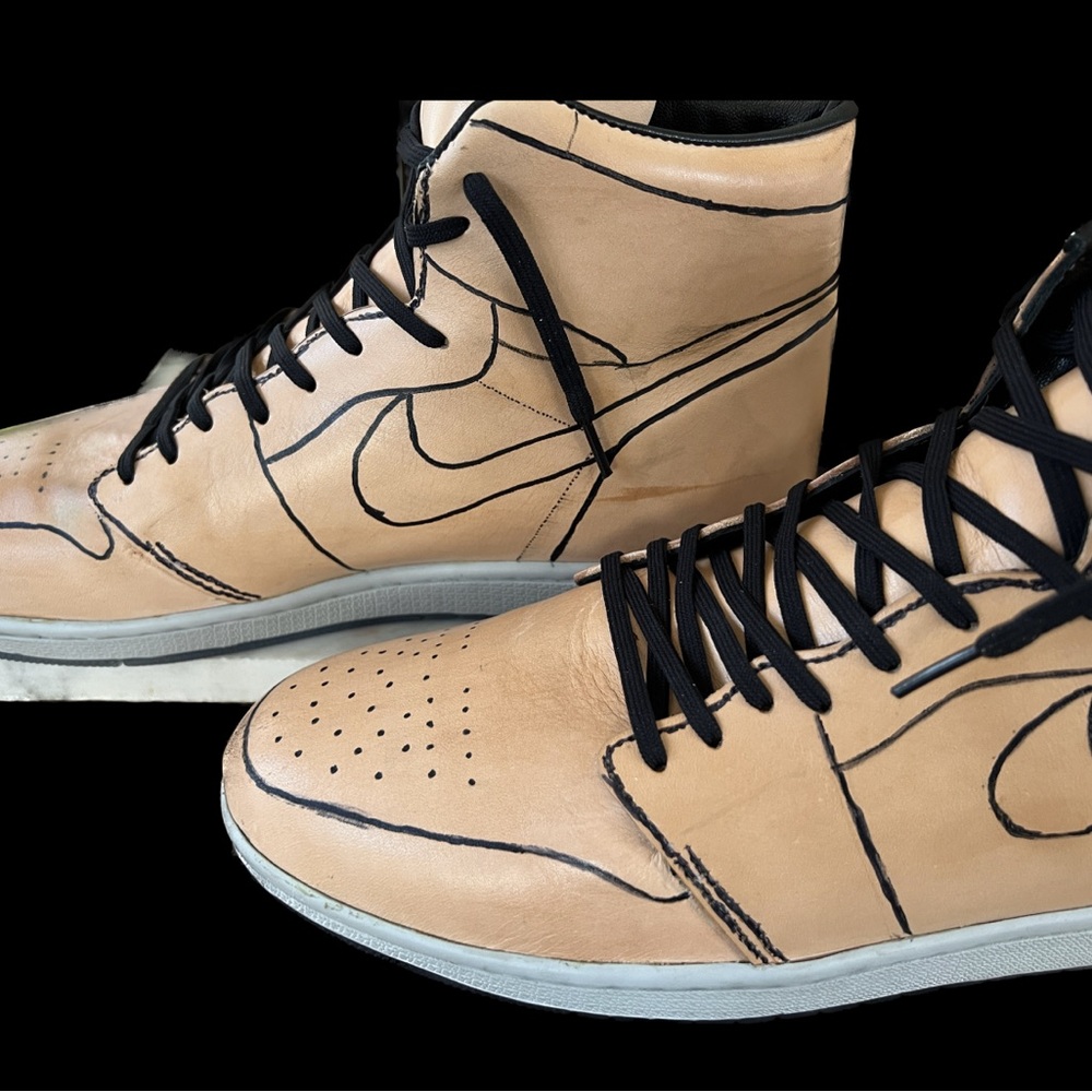 Handmade 1 of 1 air Jrdn one style design drawn on 2 piece vegtan leather upper.